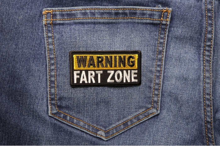 Warning Fart Zone Funny Iron on Patch shown on jeans