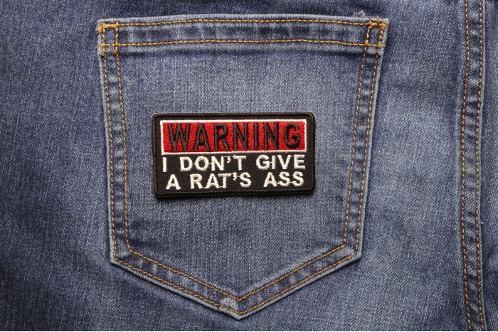 Warning I Don't Give A Rats Ass Funny Iron on Patch shown on jeans