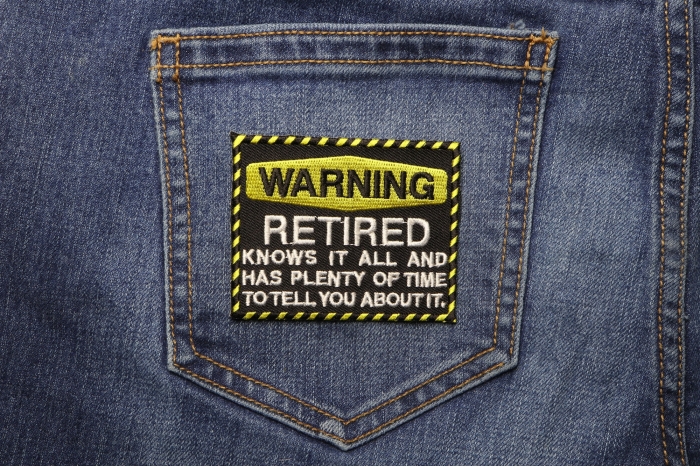 Warning Retired Knows It All Funny Iron on Patch shown on jeans