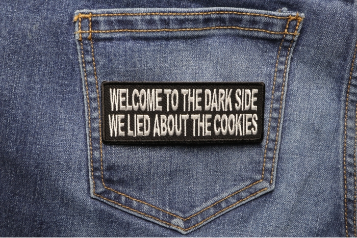 Welcome To The Dark Side We Lied About The Cookies Funny Iron on Patch shown on jeans