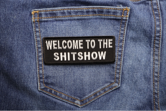 Welcome To The ShitShow Fun Funny Iron on Patch shown on jeans