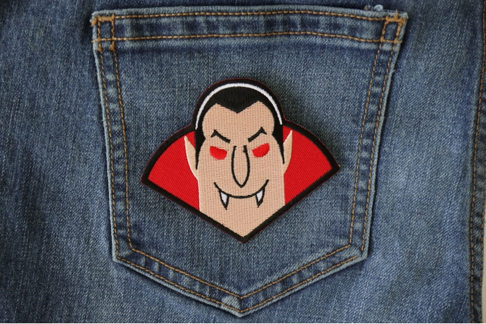 Whacky Dracula Vampire Iron on Funny Iron on Patch shown on jeans