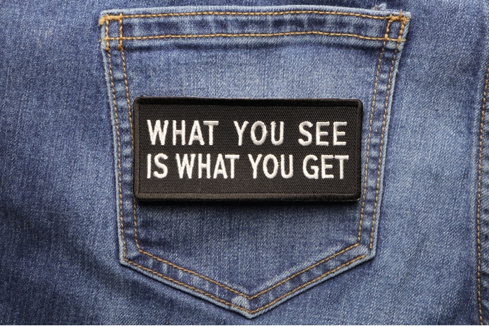 What You See Is What You Get Funny Iron on Patch shown on jeans