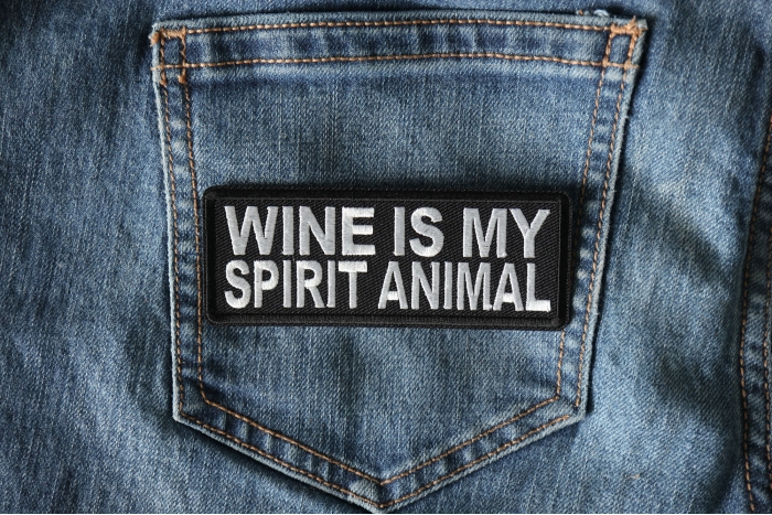 Wine is my Spirit Animal Funny Iron on Patch shown on jeans