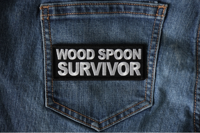 Wood Spoon Survivor Funny Iron on Patch shown on jeans