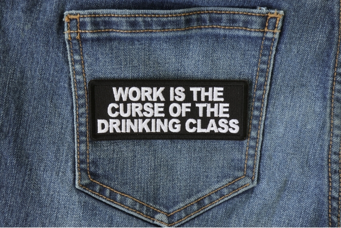 Work is the Curse of The Drinking Class Patch shown on jeans