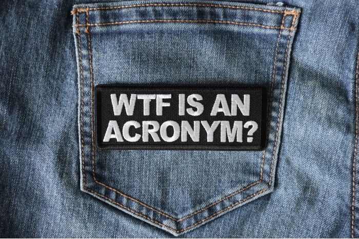 WTF is an Acronym Funny Iron on Patch shown on jeans