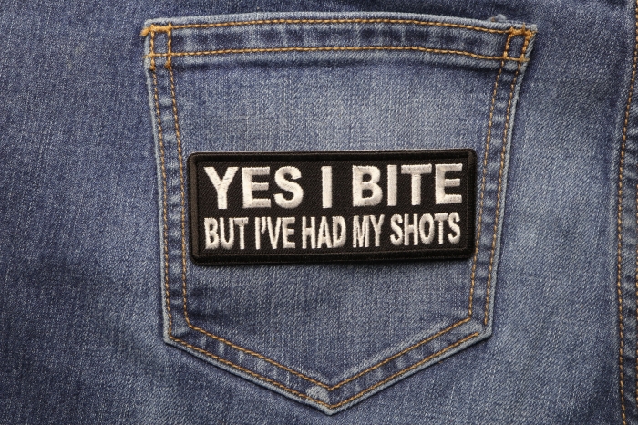Yes I Bite But I've Had My Shots Funny Iron on Patch shown on jeans