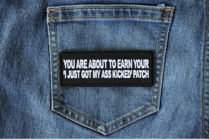 You are About to earn your I just got my Ass Kicked Funny Iron on Patch shown on jeans