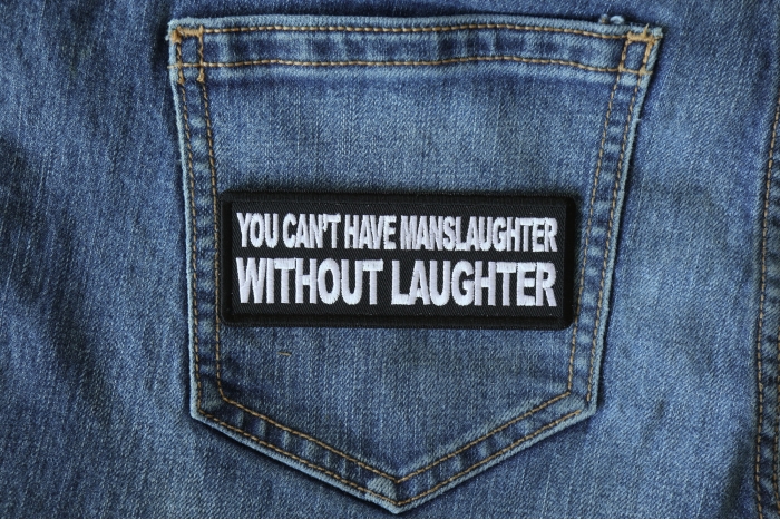 You Can't Have Manslaughter without Laughter Funny Iron on Patch shown on jeans