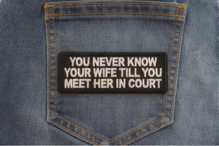 You never know your wife till you meet her in court patch shown on jeans