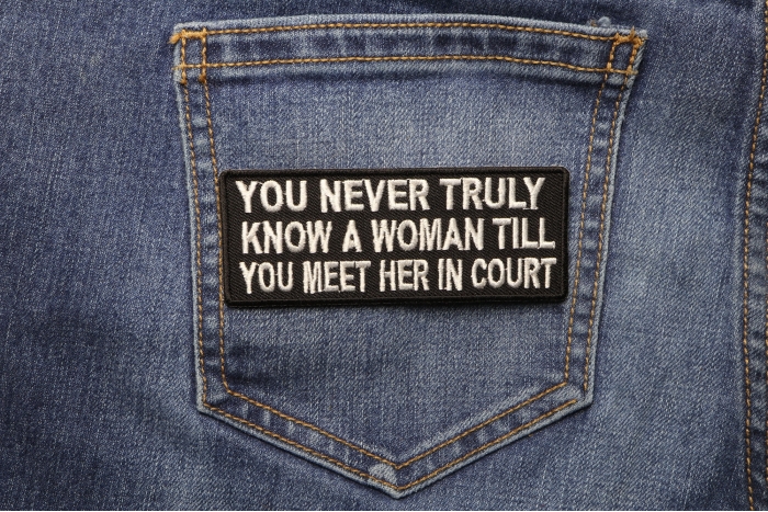 You Never Truly Know A Woman Till You Meet Her In The Court Patch shown on jeans
