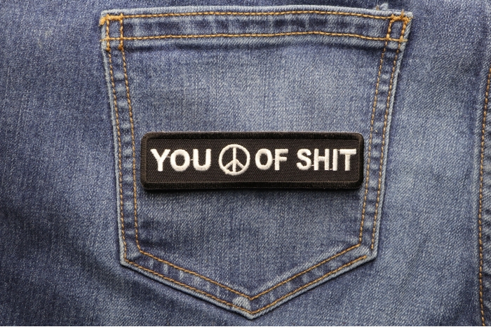 You Peace Of Shit Patch shown on jeans