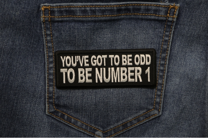 You've Got to be odd to be Number 1 Patch shown on jeans