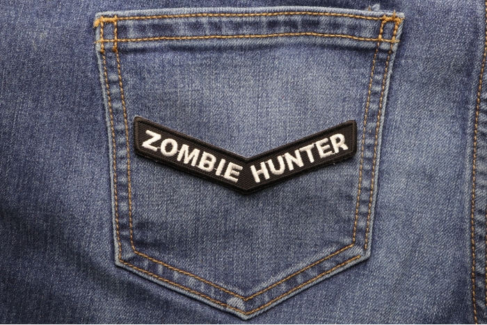 Zombie Hunter Funny Iron on Patch shown on jeans