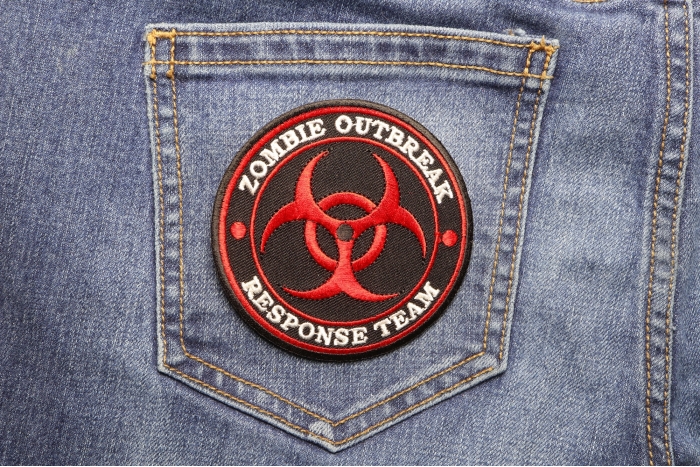 Zombie OutBreak Response Team Red Funny Iron on Patch shown on jeans