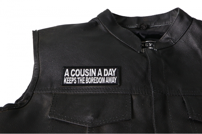 A Cousin a Day keeps the Boredom Away Patch, Funny Saying Patches shown on leather vest