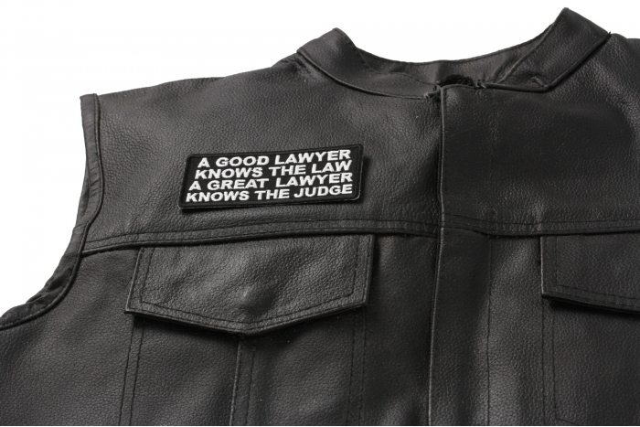 A Good Lawyer Knows The Law A Great Lawyer Knows The Judge Patch - Iron on Patch - 4x1.5 inch shown on leather vest