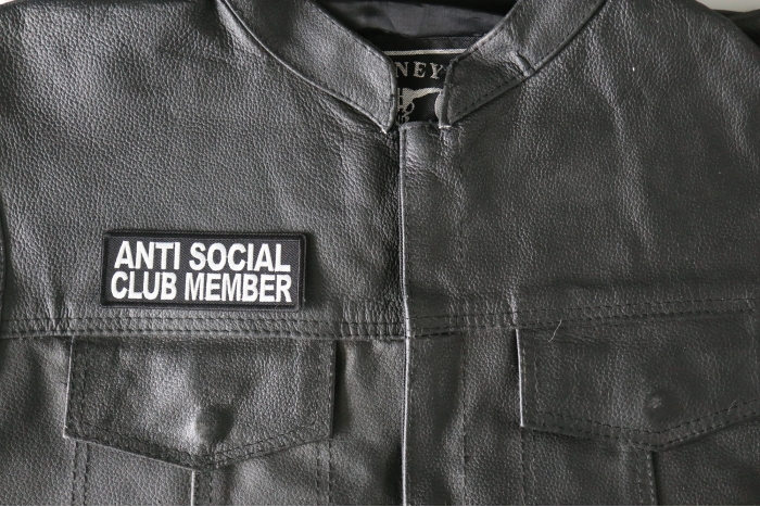 Anti Social Club Member Patch - 4x1.5 inch - Embroidered Iron on Patch shown on leather vest