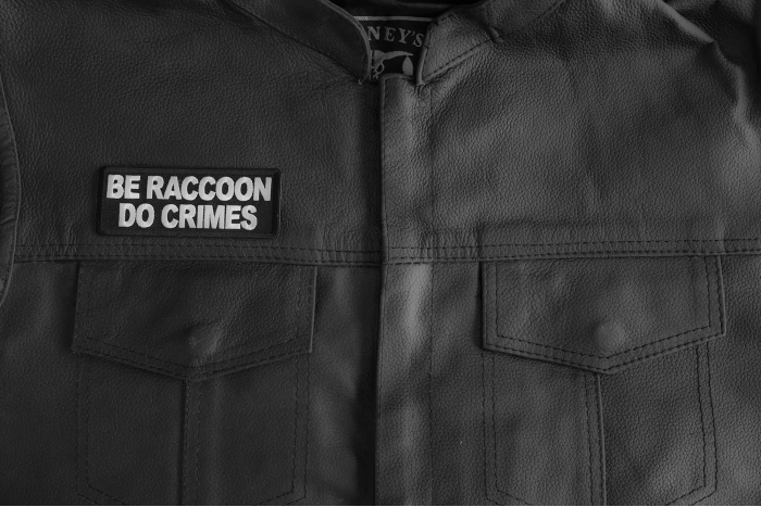 Be Raccoon Do Crimes Patch shown on leather vest