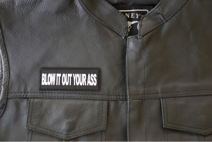 Blow it Out Your Ass Patch, Funny Saying Patches shown on leather vest