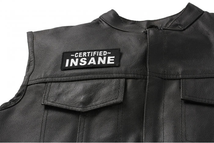 Certified INSANE Patch - 4x1.5 inch. Embroidered Iron on Patch shown on leather vest