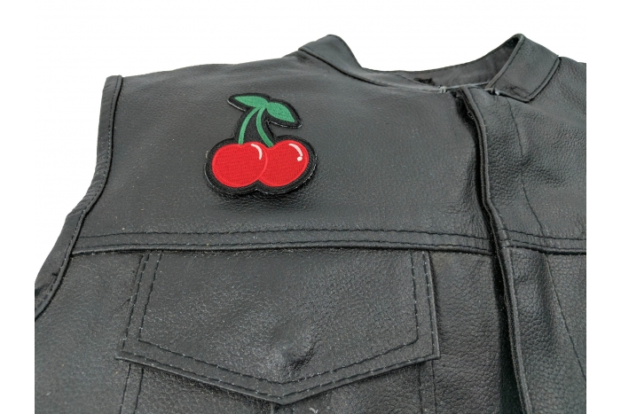 Cherry Patch - 2.3x3 inch. Embroidered Iron on Patch shown on leather vest