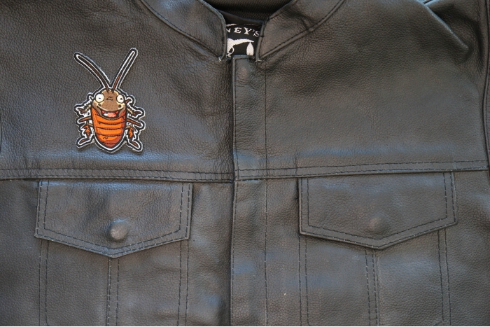 Cockroach Laugh Patch shown on leather vest