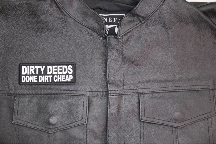 Dirty Deeds Done Dirt Cheap Patch shown on leather vest