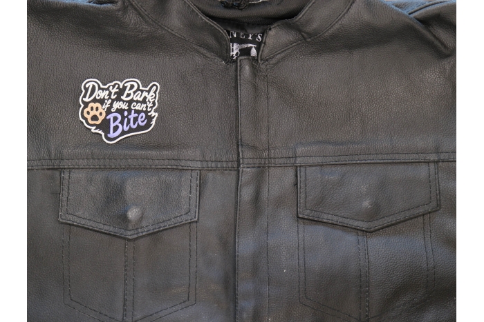 Don't Bark if you can't Bite Patch shown on leather vest
