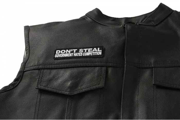 Don't Steal Government Hates Competition Patch - 4x1 inch. Embroidered Iron on Patch shown on leather vest