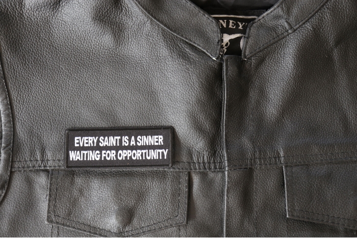 Every Saint Is a Sinner Waiting for Opportunity Patch - 4x1.5 inch - Embroidered Iron on Patch shown on leather vest