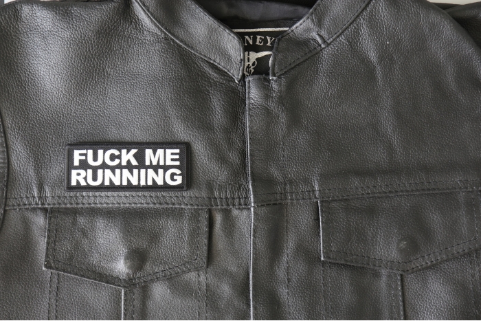 Fuck Me Running Patch - 4x1.5 inch - Embroidered Iron on Patch shown on leather vest