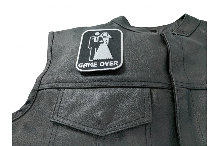 Game Over Marriage Patch Medium - 3x3.75 inch. Embroidered Iron on Patch shown on leather vest
