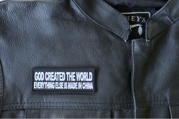 God Created the World Everything Else is Made in China Patch, Funny Saying Patches shown on leather vest