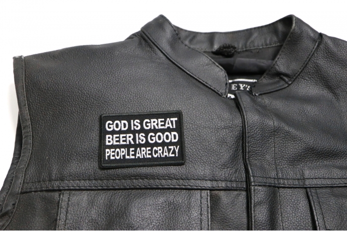 God is Great Beer is Good People are Crazy Patch - 3x2 inch. Embroidered Iron on Patch shown on leather vest