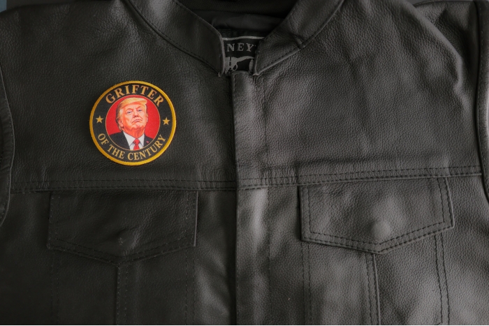 Grifter Of The Century Trump Patch shown on leather vest