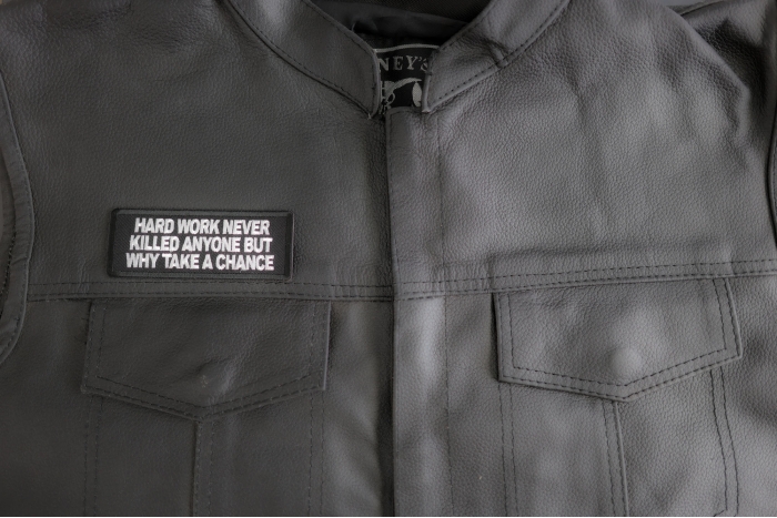 Hard Work Never Killed Anyone But Why Take A Chance Patch shown on leather vest