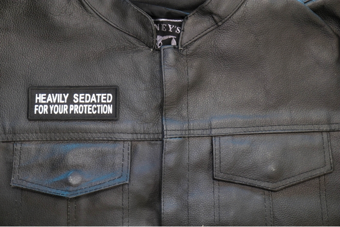 Heavily Sedated For Your Protection Patch, Funny Saying Patches shown on leather vest