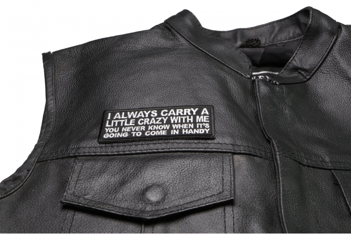 I Always Carry a Little Crazy with Me You Never Know When It's Going to Come in Handy Patch - 4x1.5 inch. Embroidered Iron on Patch shown on leather vest