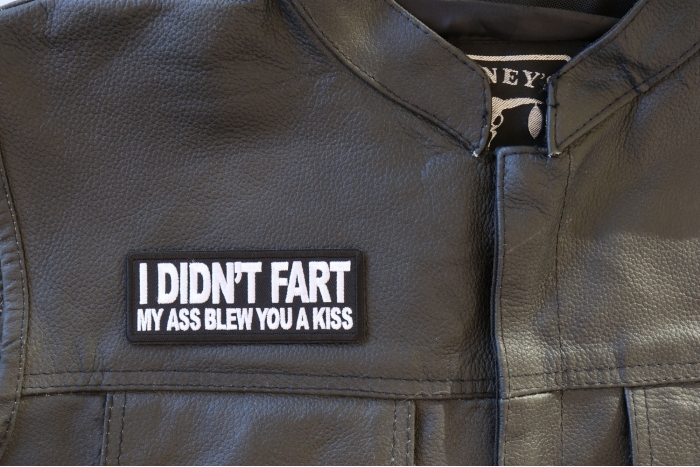 I didn't Fart My Ass Blow you a Kiss Patch - 4x1.5 inch - Embroidered Iron on Patch shown on leather vest
