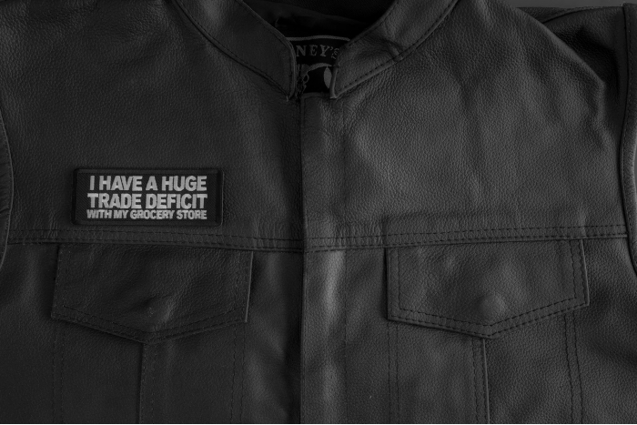 I Have A Huge Trade Deficit With My Grocery Store Patch shown on leather vest