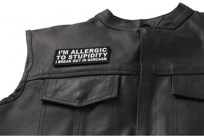 I'm Allergic to Stupidity I Break Out in Sarcasm Patch - 4x1.5 inch. Embroidered Iron on Patch shown on leather vest