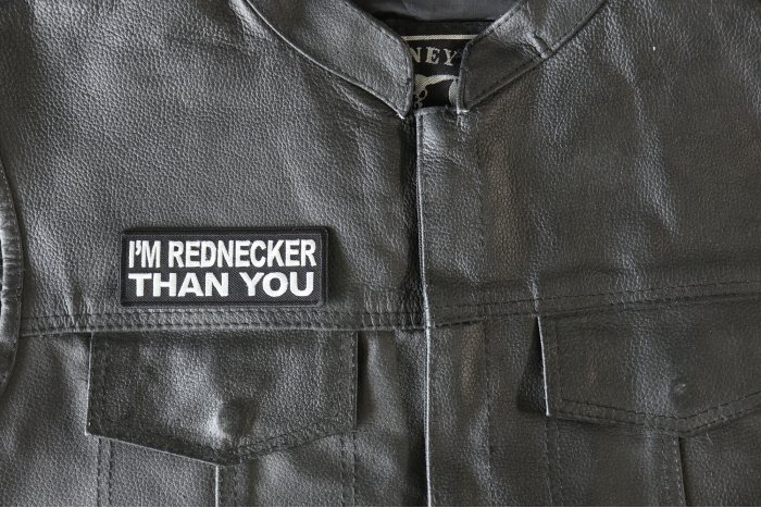 I'm Rednecker Than you Patch - 4x1.5 inch - Embroidered Iron on Patch shown on leather vest