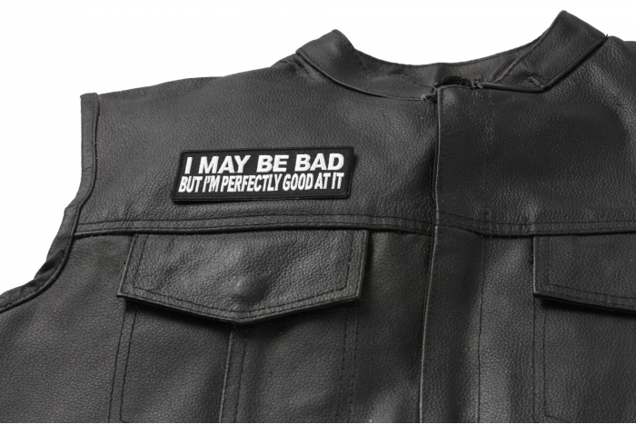 I May Be Bad But I'm Good At It Patch - 4x1.5 inch. Embroidered Iron on Patch shown on leather vest