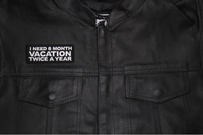 I Need a 6 month Vacation Twice a Year Patch shown on leather vest