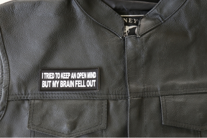 I Tried to Keep an Open Mind But My Brain Fell Out Patch - 4x1.5 inch. Embroidered Iron on Patch shown on leather vest