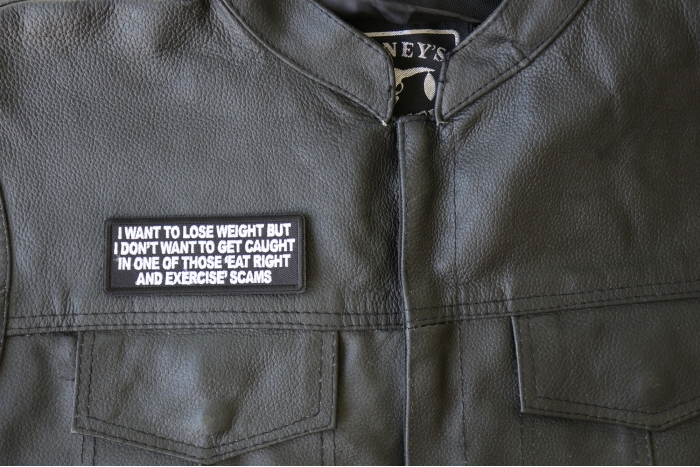 I Want to Lose Weight But I Don't Want to Get Caught in one of those Eat Right and Exercise Scams Patch, Funny Saying Patches shown on leather vest