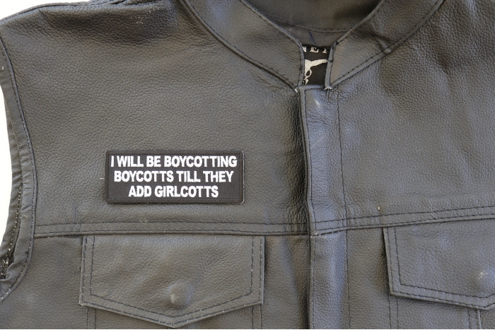 I Will Be Boycotting Boycotts Till They add Girlcotts Patch - 4x1.5 inch. Embroidered Iron on Patch shown on leather vest