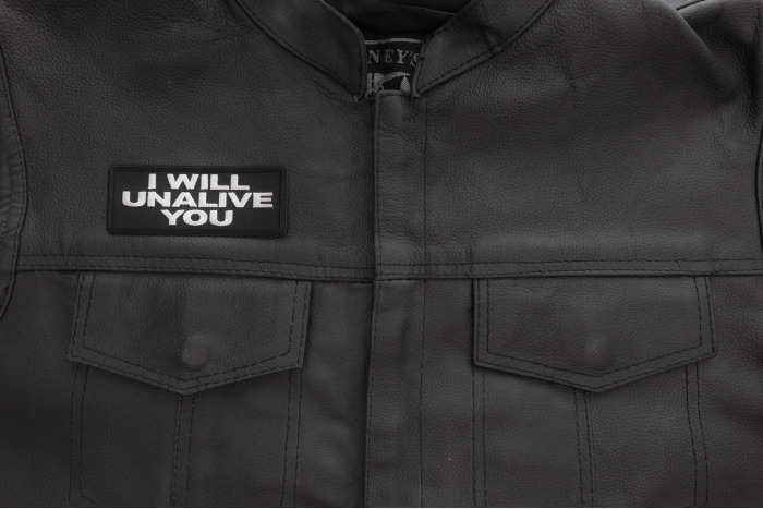 I will unalive you patch shown on leather vest